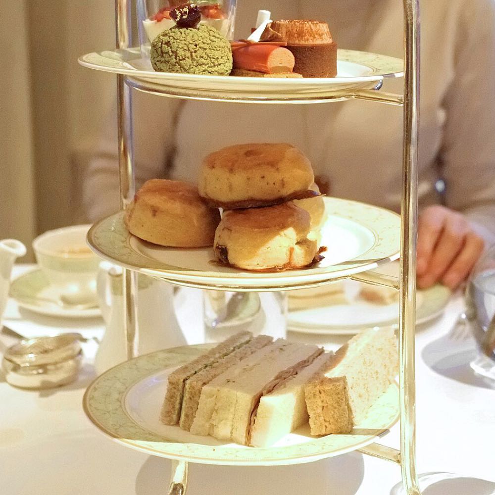 A three-tier stand of sandwiches, scones and cakes at the Park Room's afternoon tea