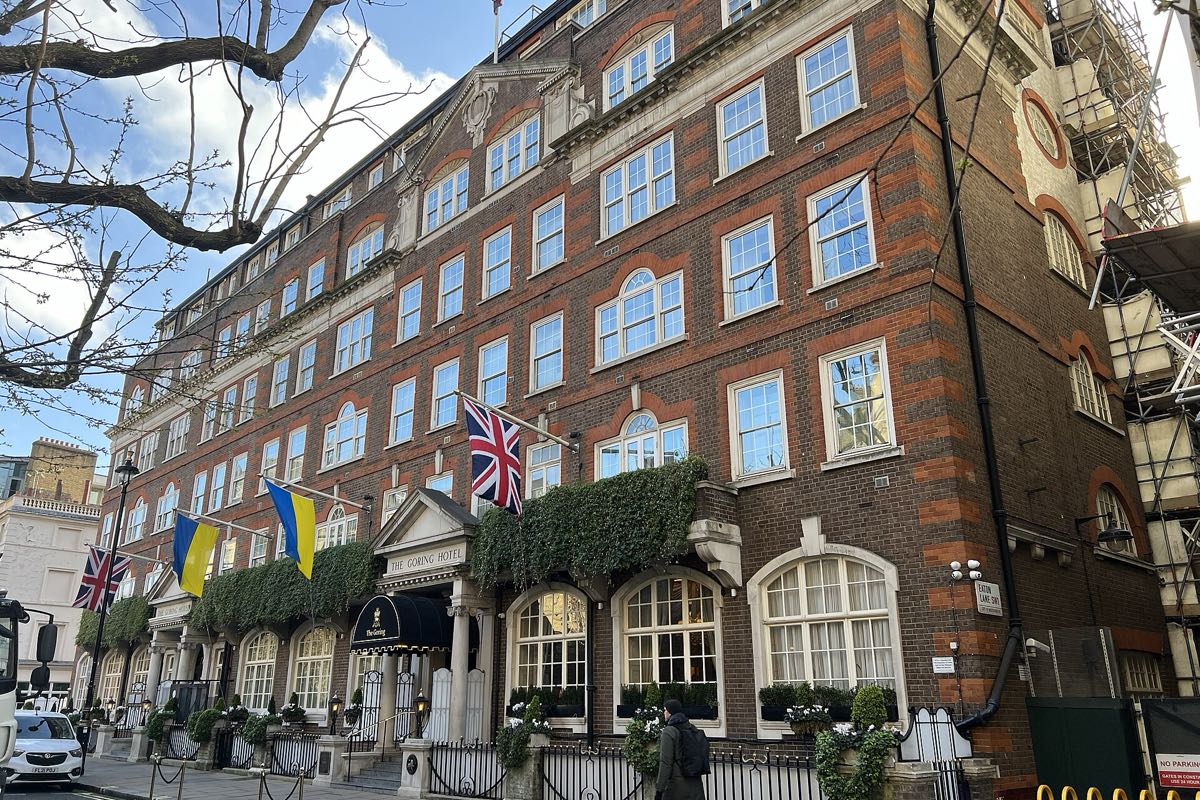 The Goring, a brick and stone hotel in Belgravia with flags over the door